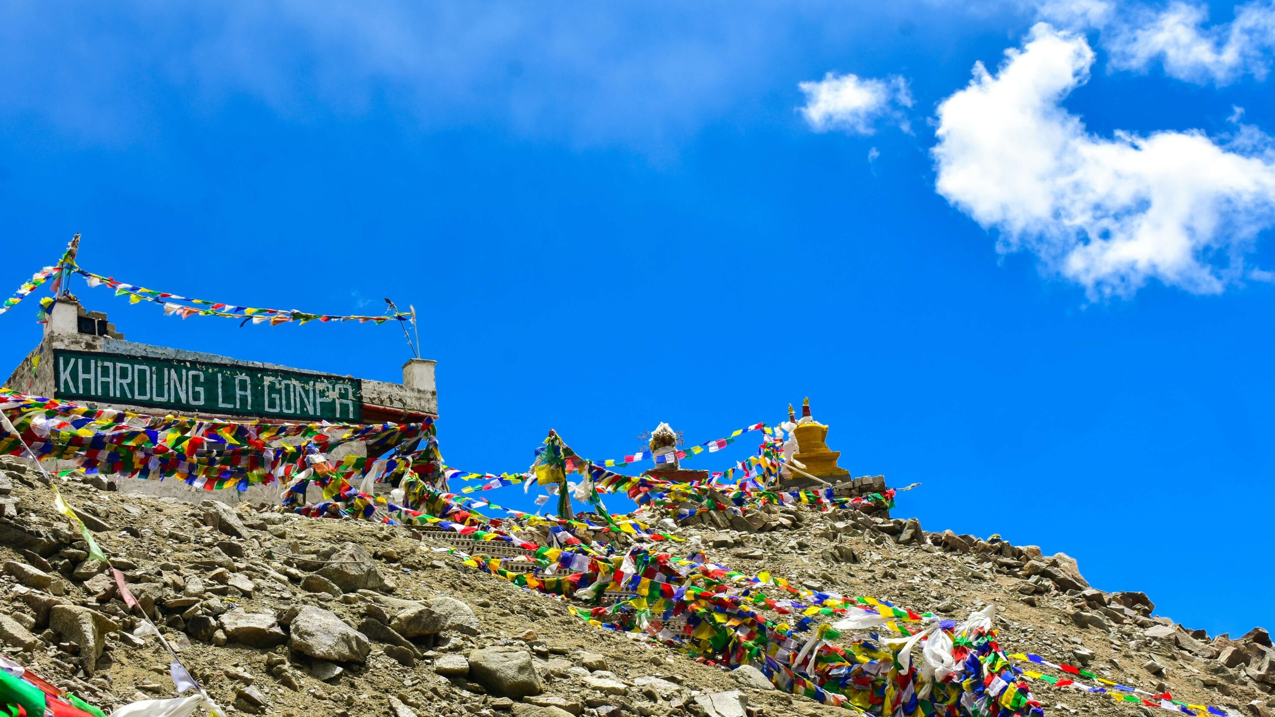 Khardung La highest motorable road mountain pass snow Ladakh bikers