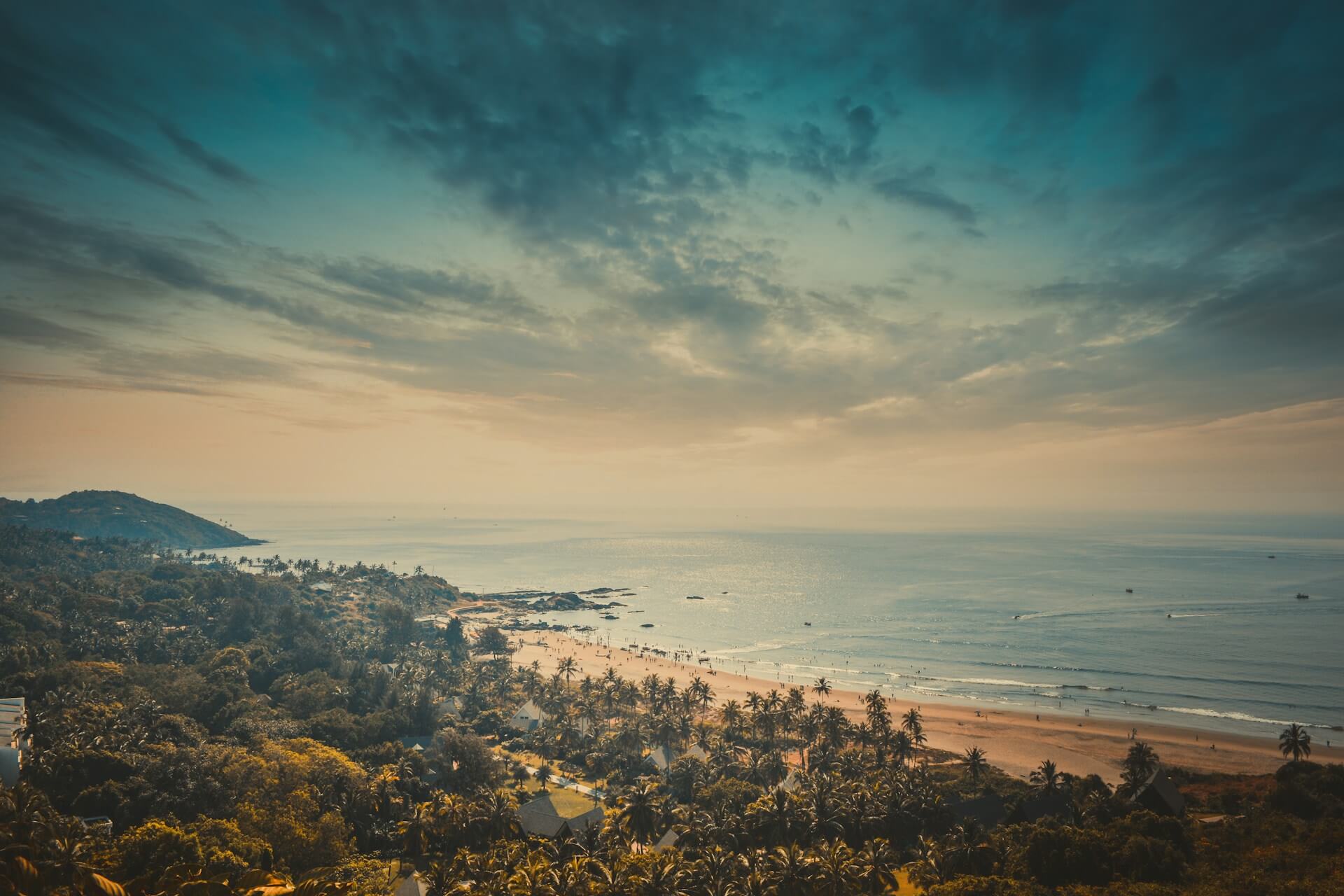 Anjuna Beach North Goa flea market rocky coastline hippie traveller scene