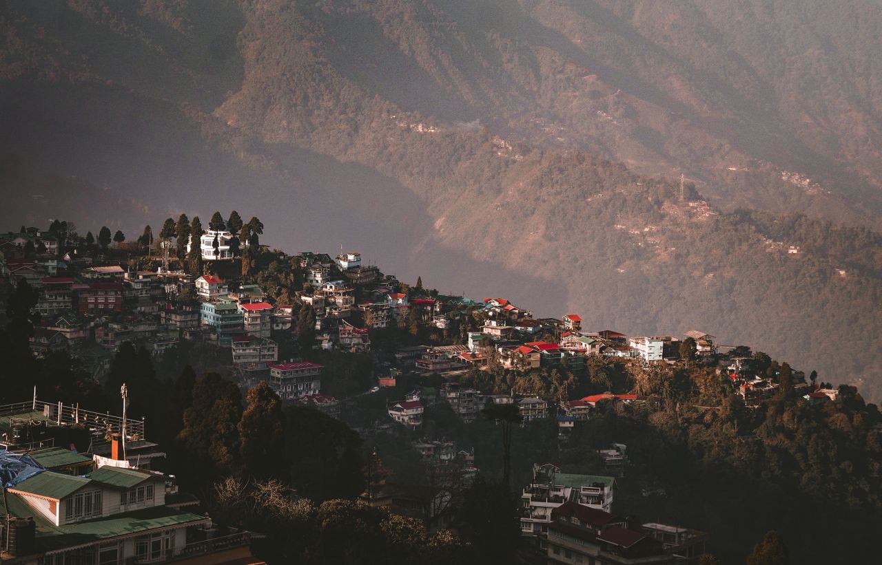 Darjeeling upper town Chowrasta Mall Road colonial buildings tea shops pedestrian promenade