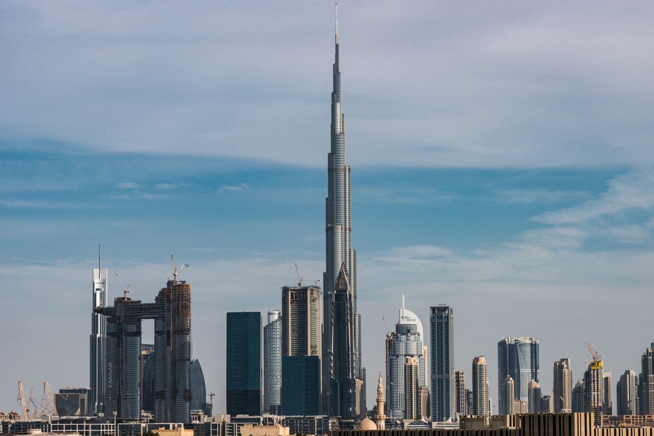 The Burj Khalifa rising above Downtown Dubai at sunset