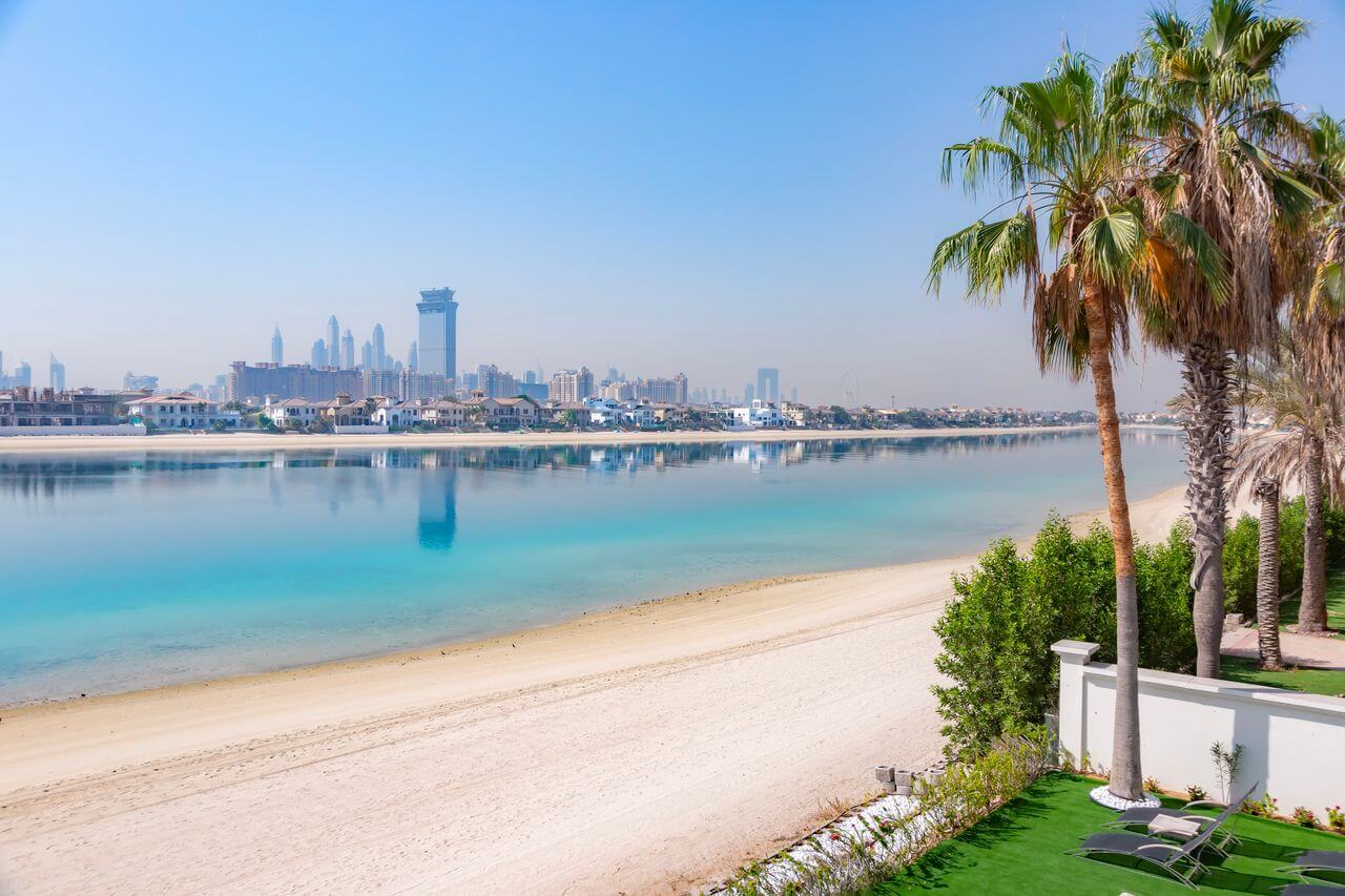 Aerial view of Palm Jumeirah island and the Dubai Marina skyline