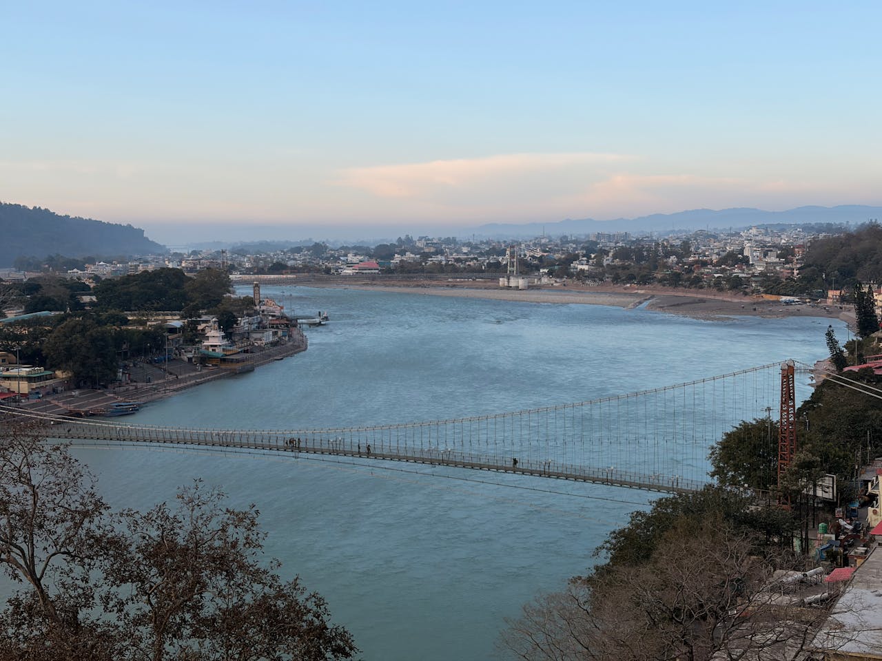 Lakshman Jhula area Rishikesh Ganges river suspension bridge market ghats Uttarakhand