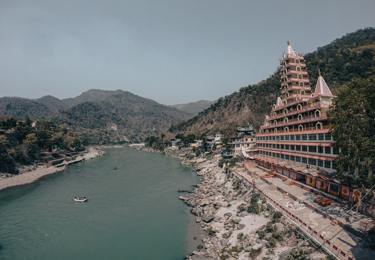 Triveni Ghat Rishikesh morning aarti sunrise pilgrims bathing Ganges Uttarakhand