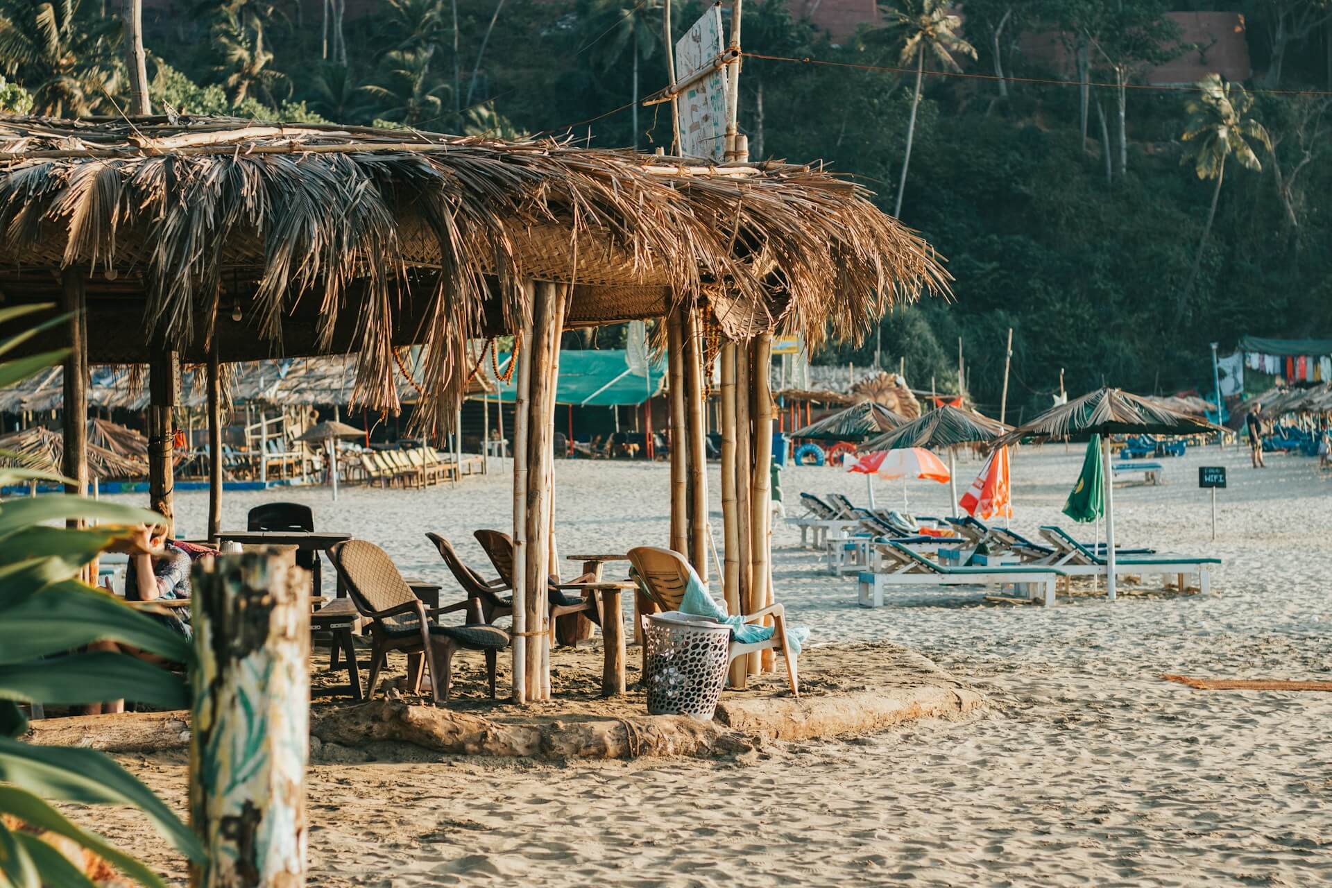 Vagator Ozran Little Vagator beach Goa red cliffs dramatic coastline sunset